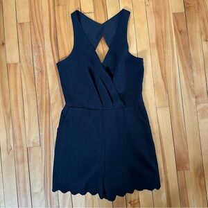 Black Crepe Material Sleeveless Romper with Scalloped Hem